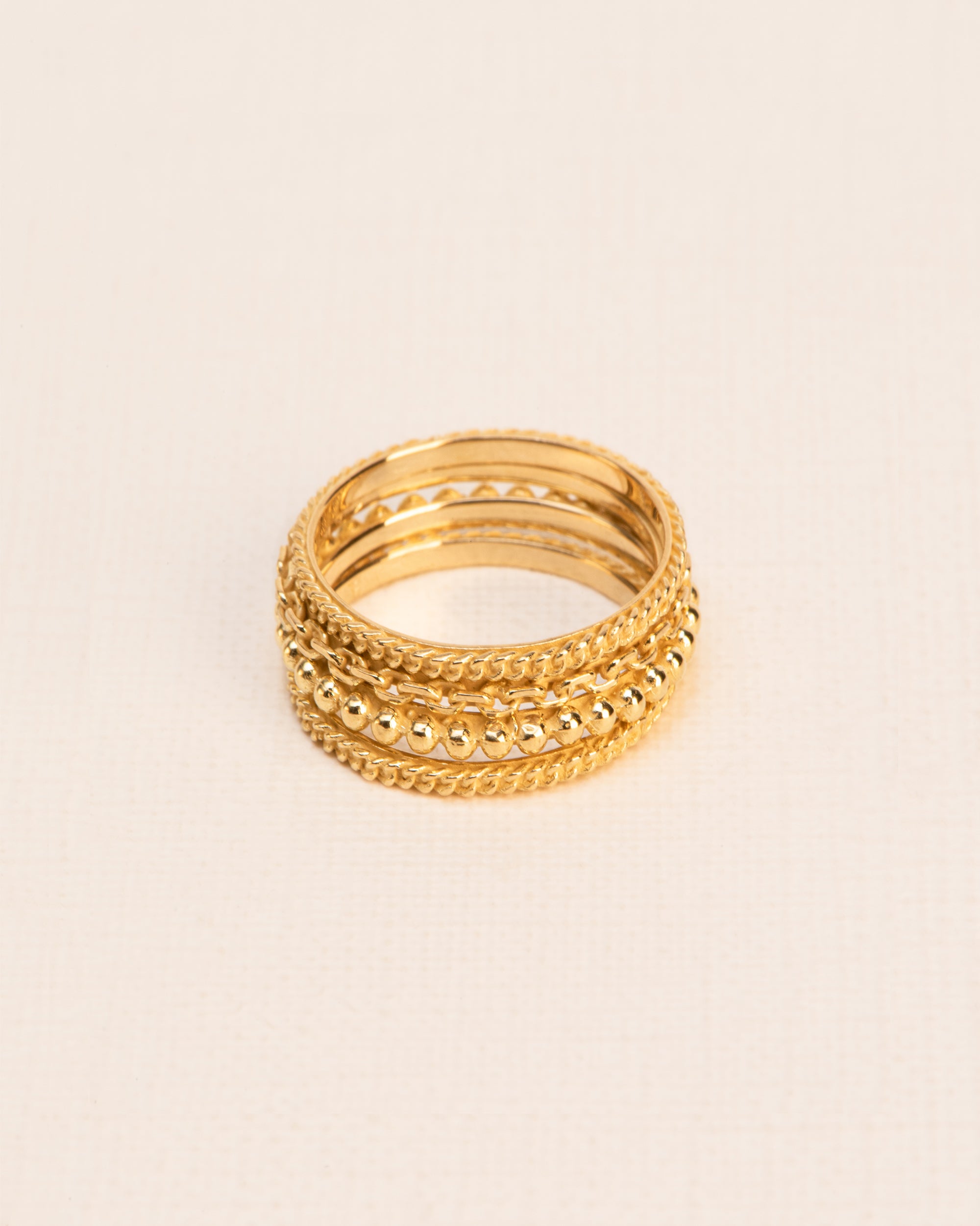 Set of four stacked 'Chapters' rings in 18 ct. gold